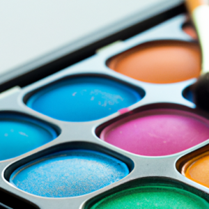 A close-up of a colorful eyeshadow palette with a brush and eyeshadow applicator.