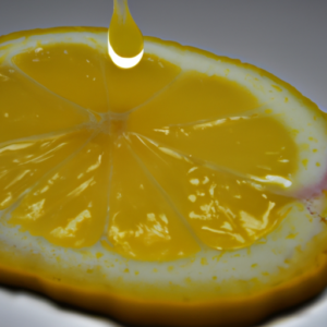 A bright yellow lemon slice with drops of toner dripping down its sides.