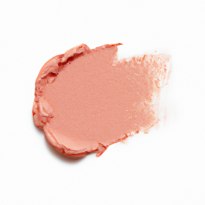 A pale pink blush swatch on a white background.