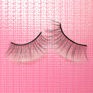 A pair of false eyelashes with a shimmery pink background.
